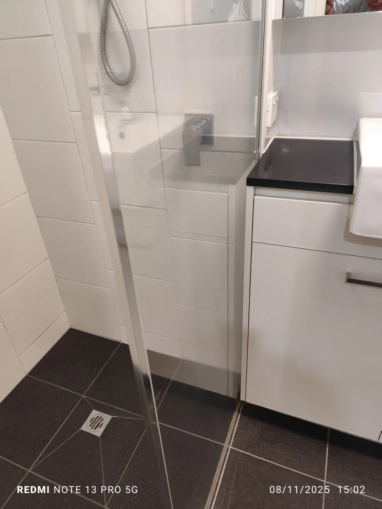 Shower glass viewed from vanity after cleaning