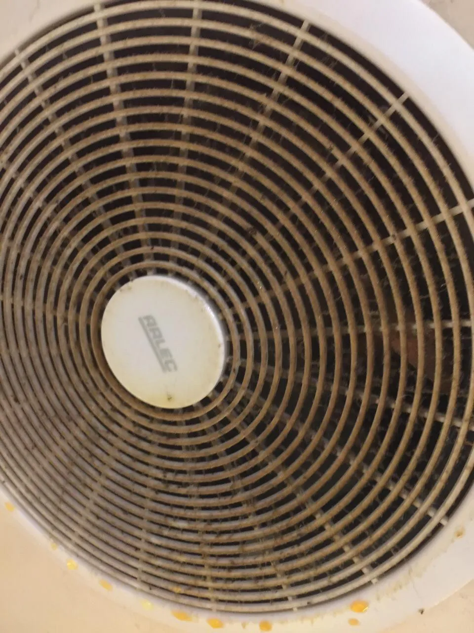 Exhaust fan cover before cleaning